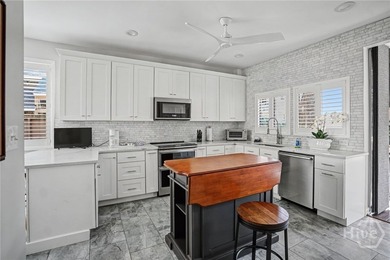 This beautifully updated end-unit condo offers the perfect - photo 9