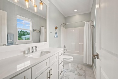 Rare main-level primary suite - while most 30A homes stack all - photo 31