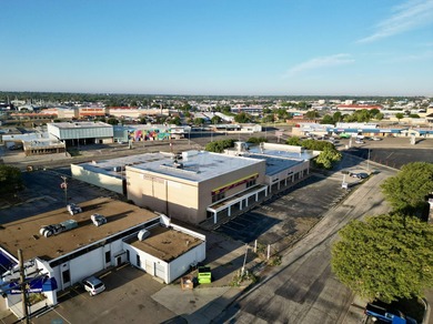 Explore the potential of this iconic 4-story commercial building