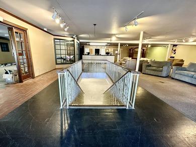 Explore the potential of this iconic 4-story commercial building