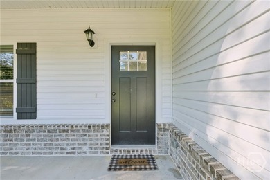 Welcome to this charming coastal cottage situated on an - photo 8