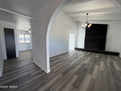 This home features potential for growth with over an acre of