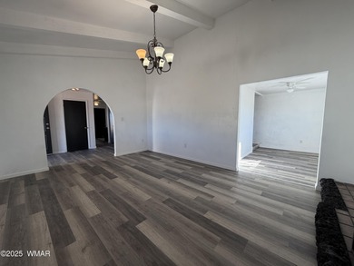 This home features potential for growth with over an acre of