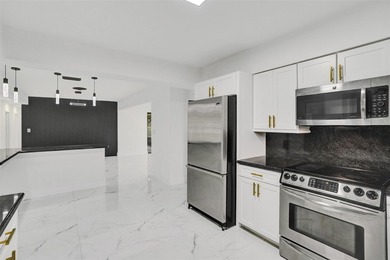 This single family home in Plantation Isles offers a practical - photo 12
