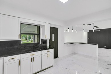This single family home in Plantation Isles offers a practical - photo 13