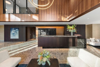 Residence 16B at Quay Tower offers exceptional waterfront living - photo 15