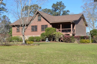 REDUCED!!!!  Custom log home on an elevated 0.91 acre lot. - Lake Home For Sale in Ridgeway, South Carolina