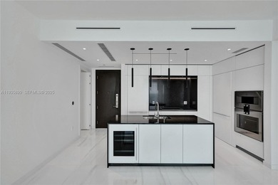 Experience unparalleledd luxury in this 2-bedroom + den, 3.5