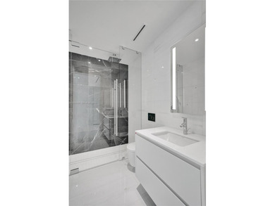 Experience unparalleledd luxury in this 2-bedroom + den, 3.5