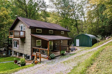 Tucked away in the mountains of West Virginia, this lovely - photo 2