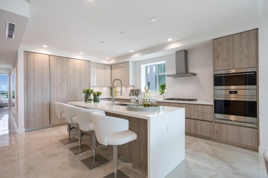 NEW FOUR BEDROOM PLUS DEN, HALF-FLOOR RESIDENCE IN THE HEART OF