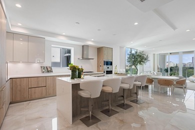 NEW FOUR BEDROOM PLUS DEN, HALF-FLOOR RESIDENCE IN THE HEART OF