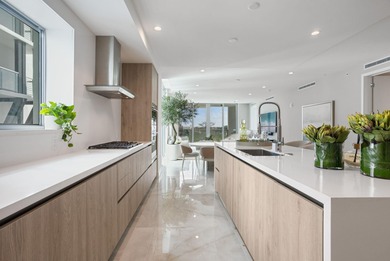 NEW FOUR BEDROOM PLUS DEN, HALF-FLOOR RESIDENCE IN THE HEART OF