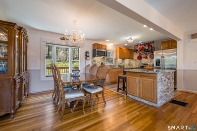 Set on over 20 breathtaking, wooded acres, this property offers - photo 5