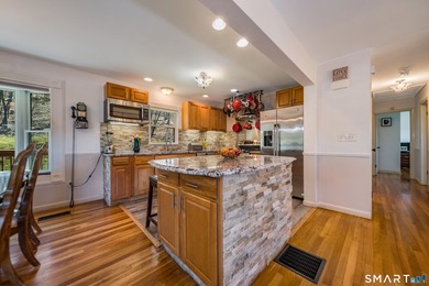 Set on over 20 breathtaking, wooded acres, this property offers - photo 6