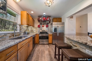 Set on over 20 breathtaking, wooded acres, this property offers - photo 7