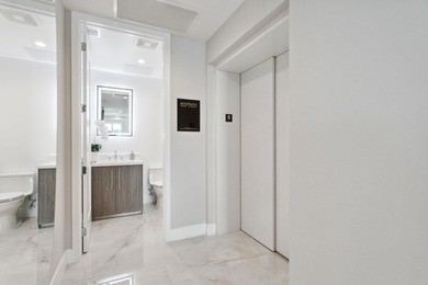 NEW FOUR BEDROOM PLUS DEN, HALF-FLOOR RESIDENCE IN THE HEART OF