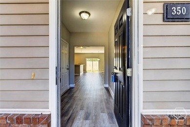 One of the newer townhomes in Live Oak Plantation. First floor - photo 3