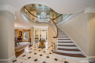 Set on 5.65 secluded acres in the heart of Madison, this - photo 2
