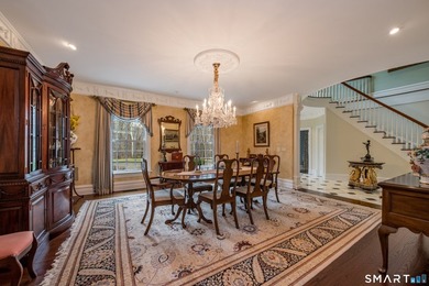 Set on 5.65 secluded acres in the heart of Madison, this - photo 5