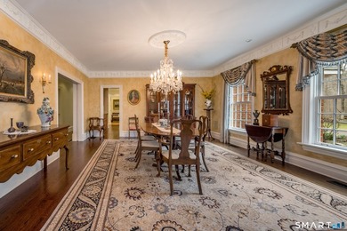Set on 5.65 secluded acres in the heart of Madison, this - photo 6