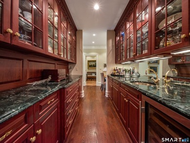 Set on 5.65 secluded acres in the heart of Madison, this - photo 7