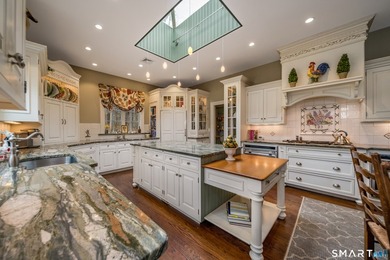 Set on 5.65 secluded acres in the heart of Madison, this - photo 9
