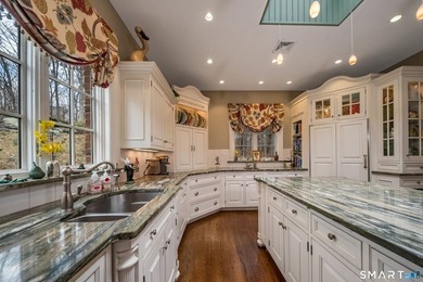 Set on 5.65 secluded acres in the heart of Madison, this - photo 10