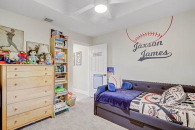 Nestled within a gated community, this spacious split-plan home