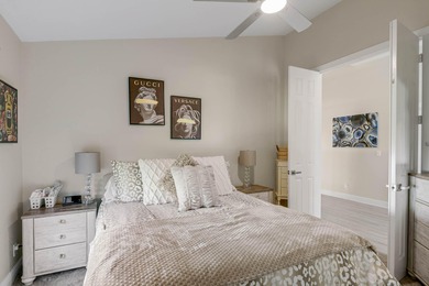 Nestled within a gated community, this spacious split-plan home