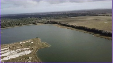 Approximately 292+- acres featuring a 90+- acre spring-fed - photo 2