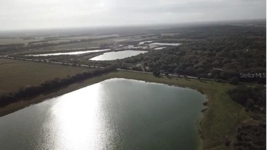 Approximately 292+- acres featuring a 90+- acre spring-fed - photo 3