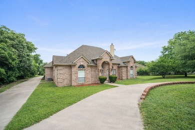 Lake living meets value in this refreshed 4-bedroom, 3-bathroom - photo 14