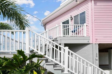 ICONIC PINK three-story octagon WATERFRONT home with PRESERVE & - photo 35