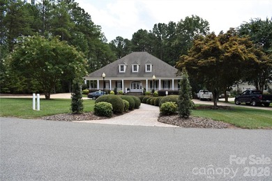 This Badin Lake area lot is located in the prestigious gated - photo 21