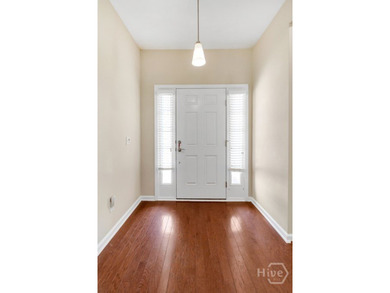 This beautifully maintained 4-bedroom, 2-bath home offers the - photo 3
