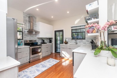Fully rebuilt in 2021, this beautiful 3 bd/2.5 bath Spanish - photo 3