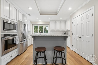 Nestled within the prestigious gated community of The Landings - photo 9