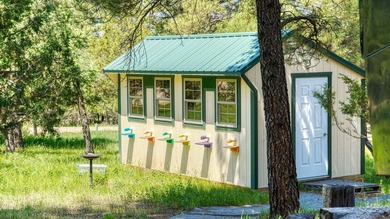 Come see this custom-built 2 BR/2 Bath home nestled among pine - photo 38