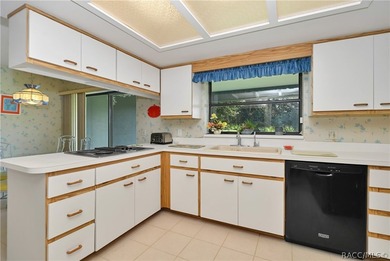 A MUST see... A rare find! This spacious charming 1986-built one - photo 15