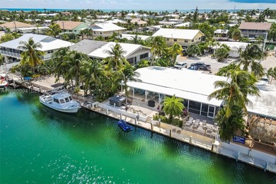 Turnkey, fully furnished waterfront property with strong  income - photo 1