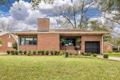 Classic brick home blending historic charm with modern comforts - photo 1