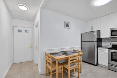 Fully updated 2/2 with 1-car garage! Features an open kitchen - photo 5