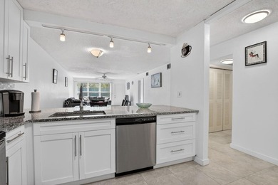 Fully updated 2/2 with 1-car garage! Features an open kitchen - photo 8