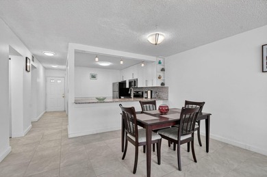 Fully updated 2/2 with 1-car garage! Features an open kitchen - photo 9