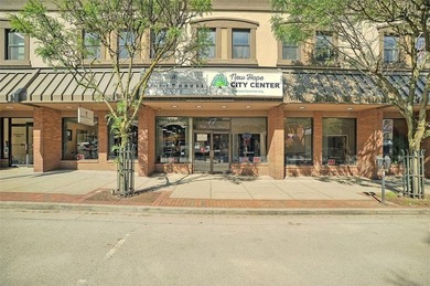 This property is comprised of a first-floor commercial space - photo 1