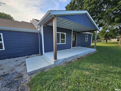 This stunning ranch-style home has been completely remodeled and