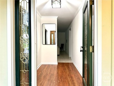 Experience the best of gated island living in this charming - photo 3