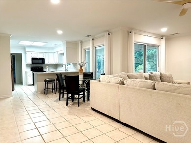 Experience the best of gated island living in this charming - photo 6