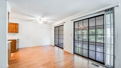Come home to this charming house nestled in the woods on over an - photo 15